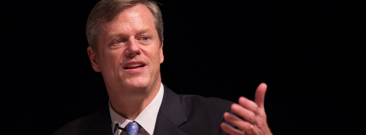 Governor Charlie Baker signs executive order at Center for Transportation and Logistics