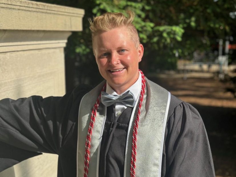 Theo Rosenzweig in graduation gown.